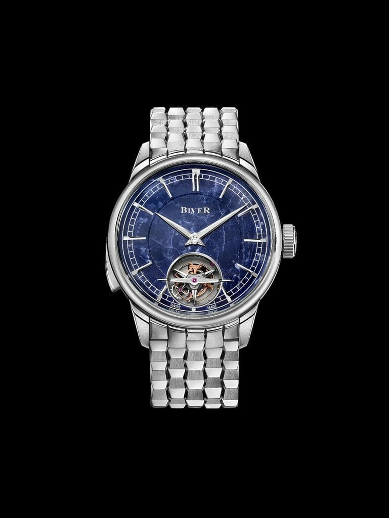 Montre Carillon Tourbillon, cadran en sodalite et bracelet métallique argenté en relief.