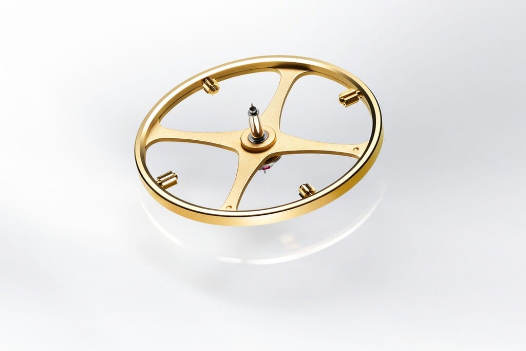 Le réglage du balancier-spiral des montres Rolex se fait à l'aide des écrous Microstella.