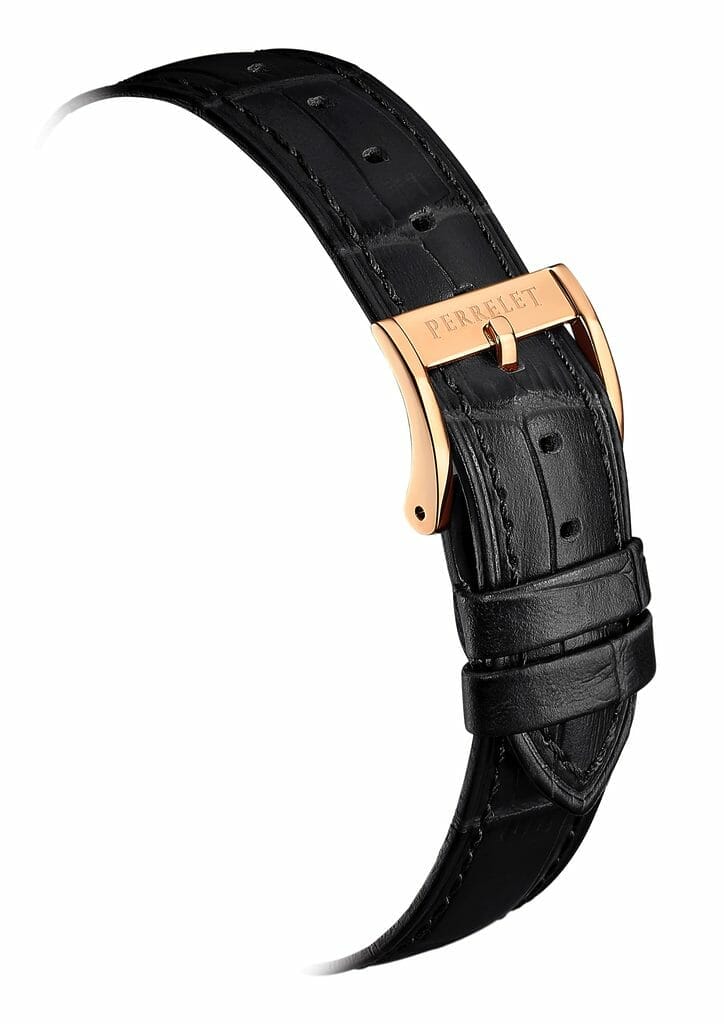 Bracelet en cuir noir finition alligator, équipé d'une boucle à ardillon personnalisée ornée du logo Perrelet assorti à la version du boîtier.