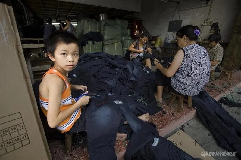 Photo d'illustration d'un enfant chinois travaillant - Source internet